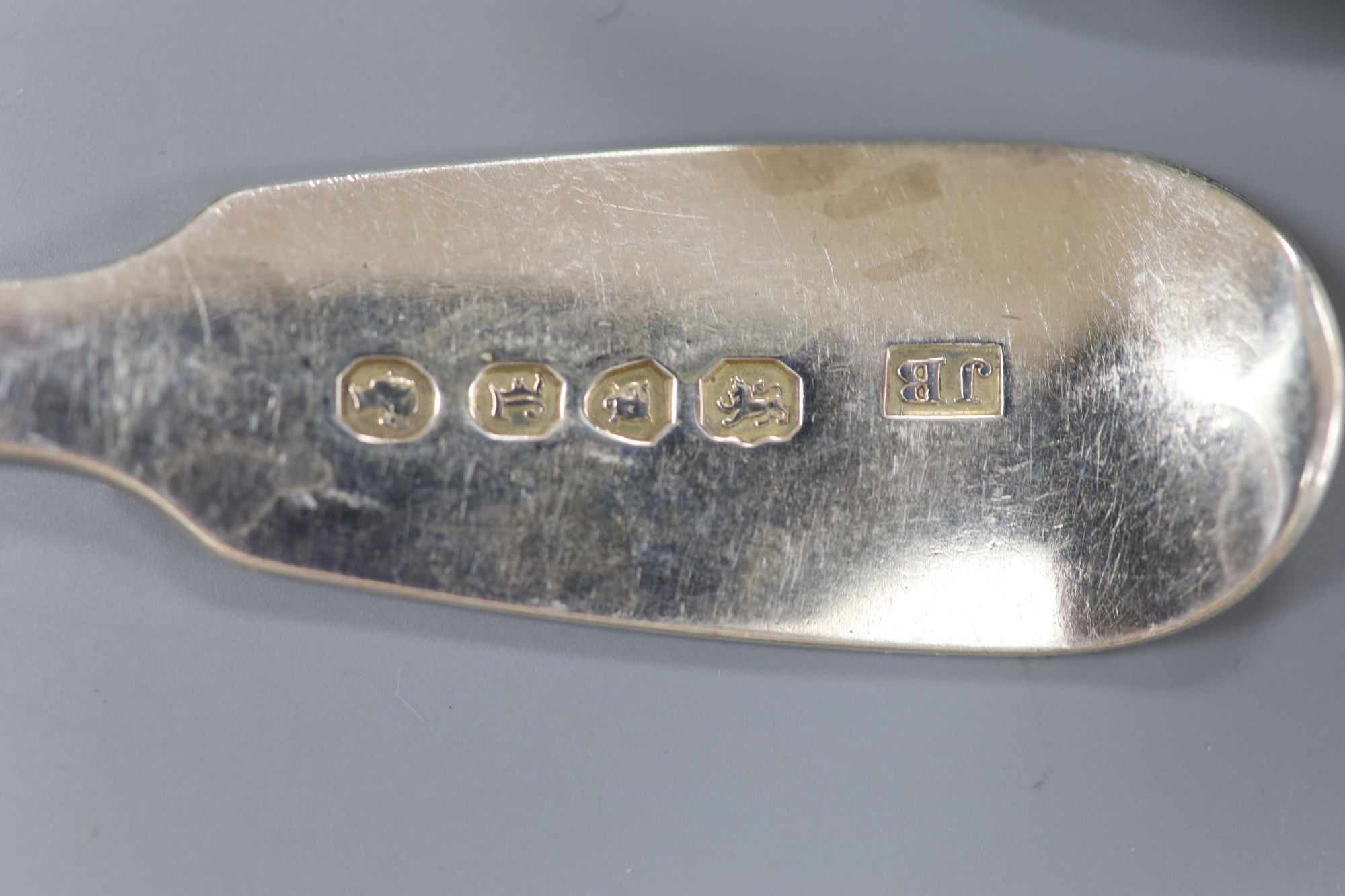 A set of six early Victorian silver fiddle pattern table spoons and six dessert spoons, James Beebe, London, 1846, 21.8oz.